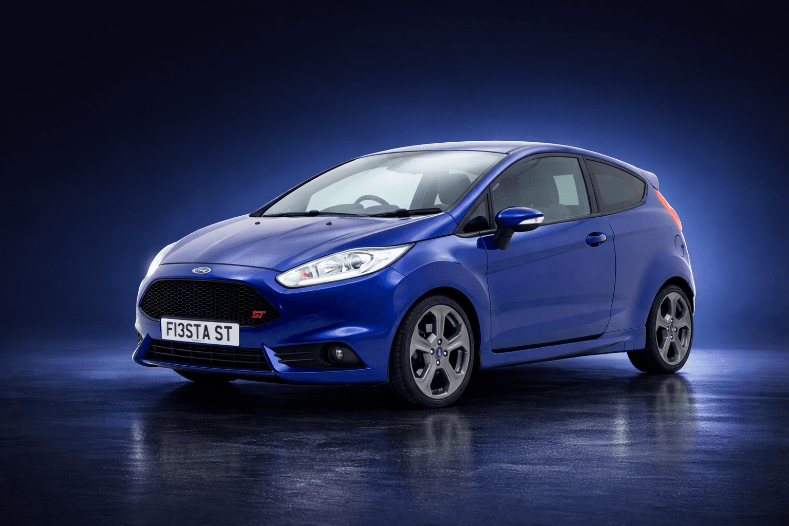 Blue Ford Fiesta ST showcasing professional vehicle refinishing by Austen Cox